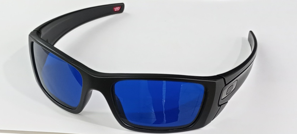 occhiali Oakley da sole con lenti blu F133