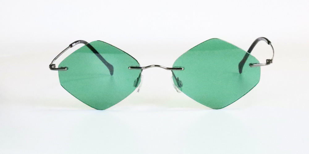 Occhiali da sole in titanio lenti rombo verde