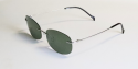 Occhiali da sole lenti verde scuro e struttura in titanio